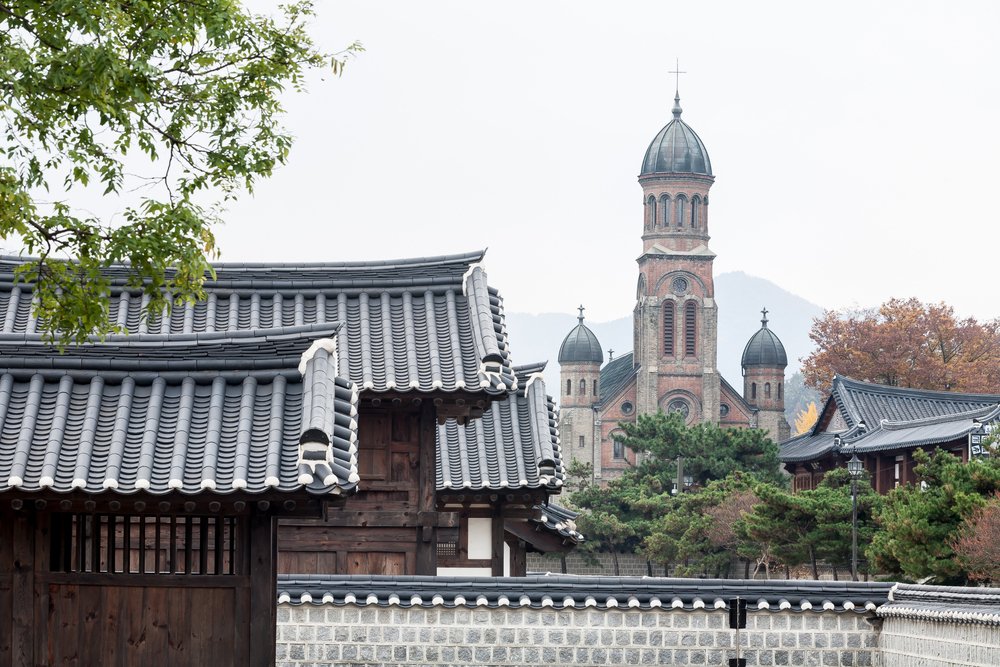 Traditional gate and stone path at Gyeonggijeon Shrine in Jeonju
